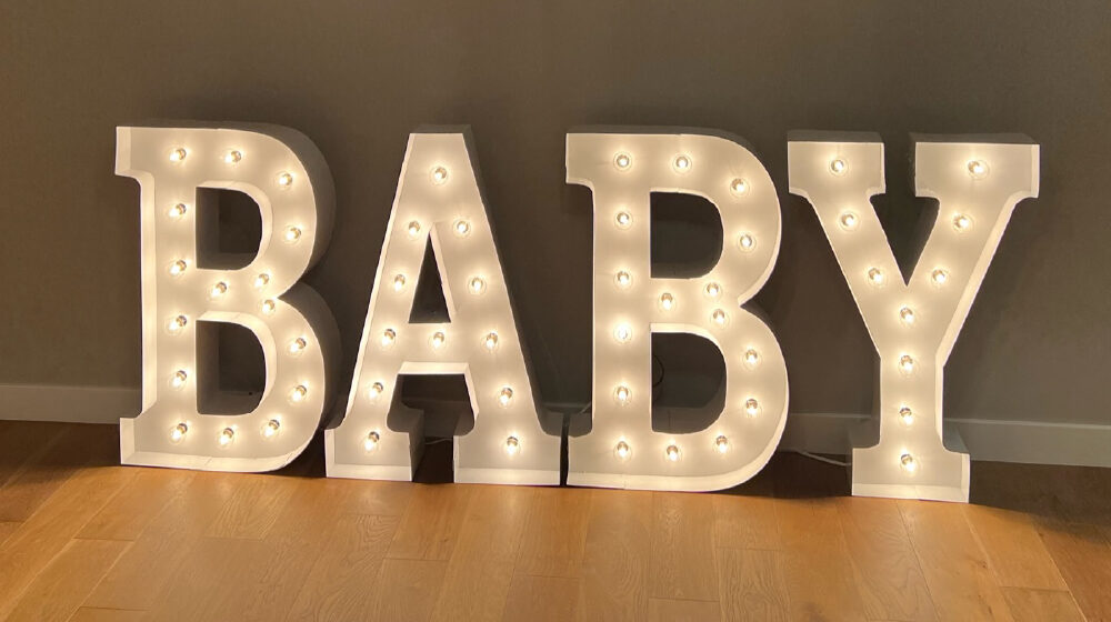 The words "Baby" in marquee letters